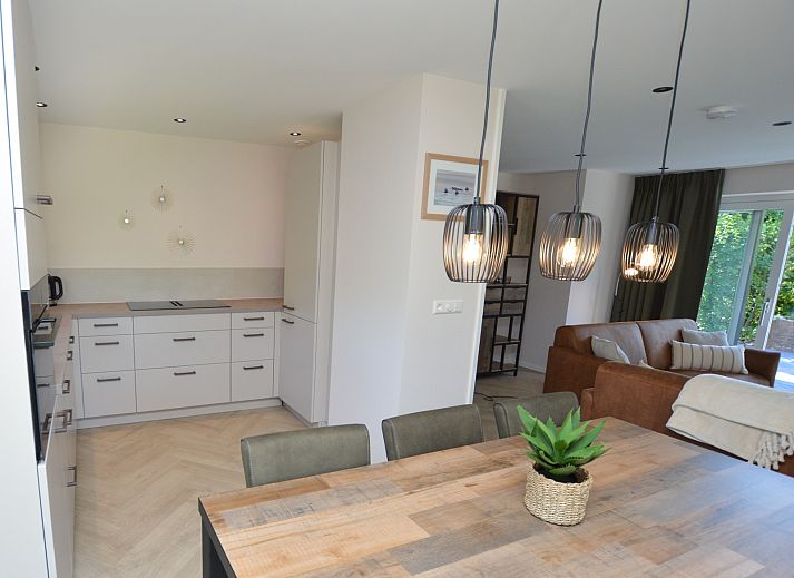 Gemuetliche Sitzecke mit Blick auf die Terrasse im Ferienhaus 't Hoogelandt 58, De Dennen, Texel.