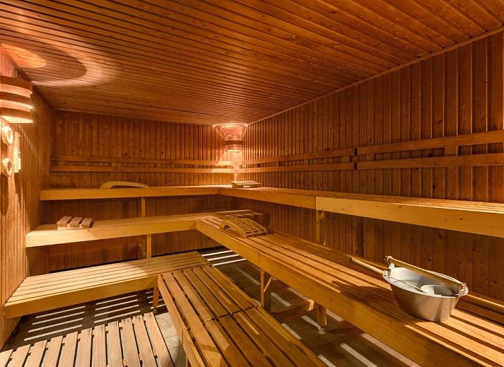 Stylish bedroom with double bed in NH Maastricht vacation apartment, Limburg.