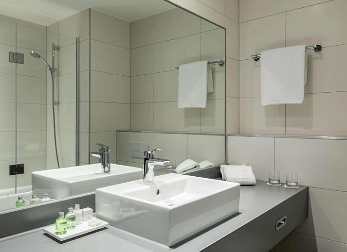 Breakfast buffet with fresh produce at NH Maastricht vacation apartment, Limburg.