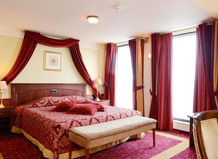Attractive bedroom in Amrath Grand Hotel de l'Empereur, Maastricht, South Limburg, ideal vacation apartment.