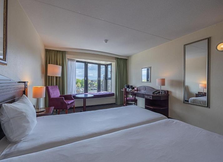 Attractive bedroom in Amrath Grand Hotel de l'Empereur, Maastricht, South Limburg, ideal vacation apartment.