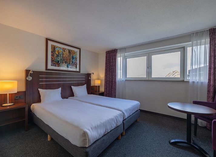 Attractive bedroom in Amrath Grand Hotel de l'Empereur, Maastricht, South Limburg, ideal vacation apartment.