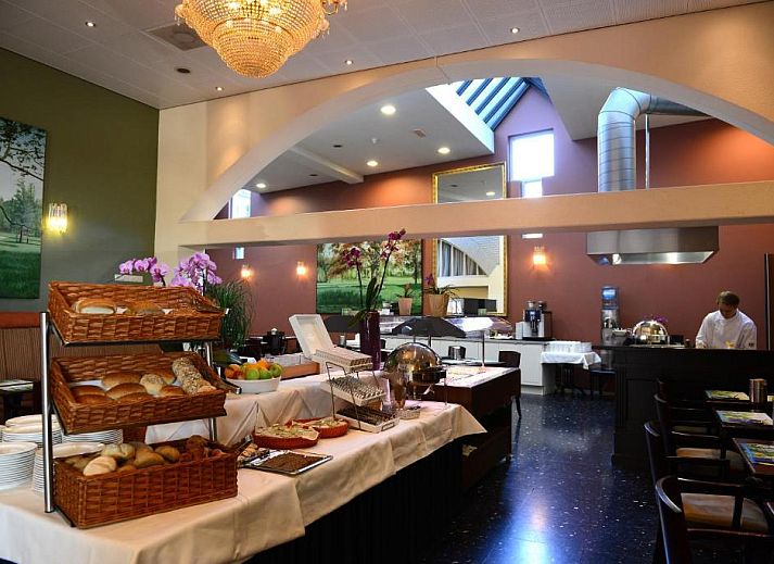 Comfortable room with a view in Amrath Grand Hotel de l'Empereur, Maastricht, perfect for a relaxing vacation.