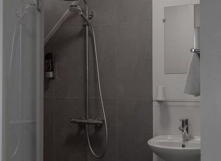 Soft towels made on bed at Hotel de la Bourse, comfortable stay in South Limburg, Maastricht.