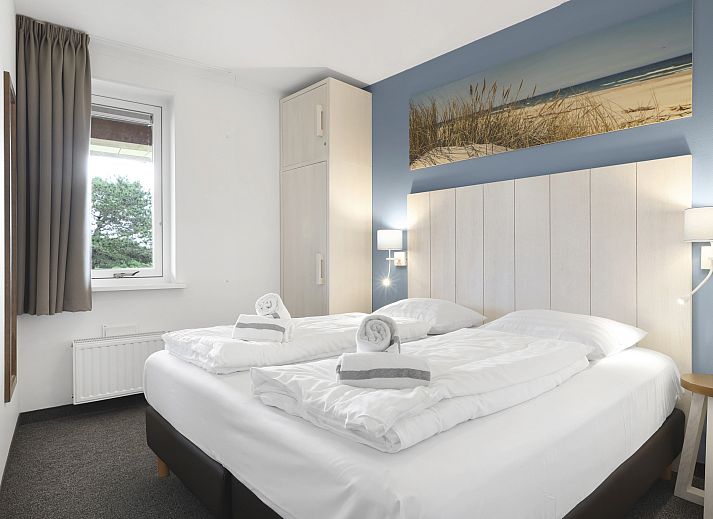 Buitenkant van Vlieduyn 2-persoons appartement met rieten dak in Oost-Vlieland, Vlieland, Waddeneilanden.