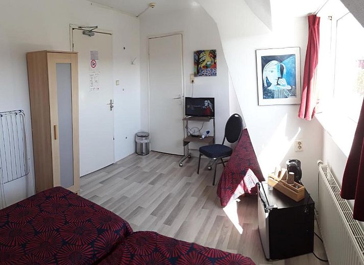 Prachtig uitzicht op de rivier vanuit Hotel Baan, centraal gelegen vakantieappartement in Rotterdam.
