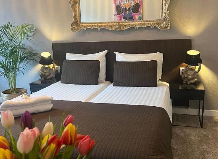 Komfortables Zimmer im Hotel Orion, Ferienwohnung in Rotterdam, Suedholland mit eleganter Einrichtung.