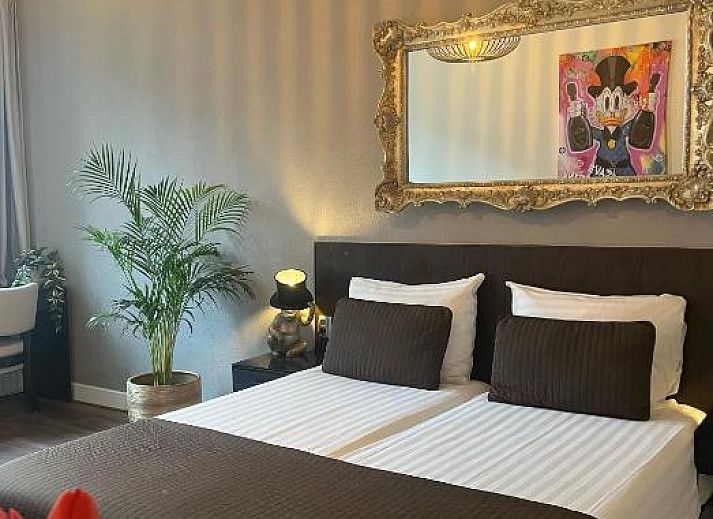 Komfortables Zimmer im Hotel Orion, Ferienwohnung in Rotterdam, Suedholland mit eleganter Einrichtung.