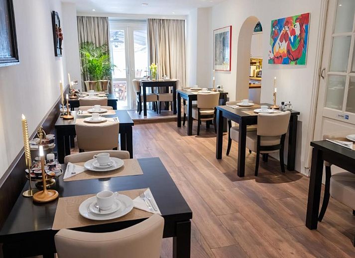 Komfortables Zimmer im Hotel Orion, Ferienwohnung in Rotterdam, Suedholland mit eleganter Einrichtung.