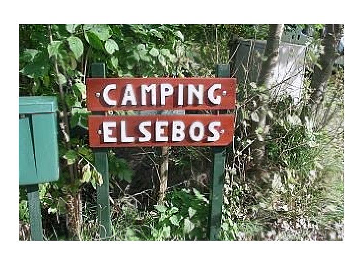 Cozy interior of De Mons chalet in Formerum, Terschelling with comfortable seating area.