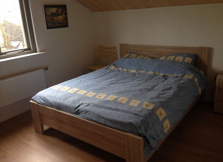 Gezellig vakantiehuis De Trekvogels in Formerum, Terschelling omringd door groene natuur.