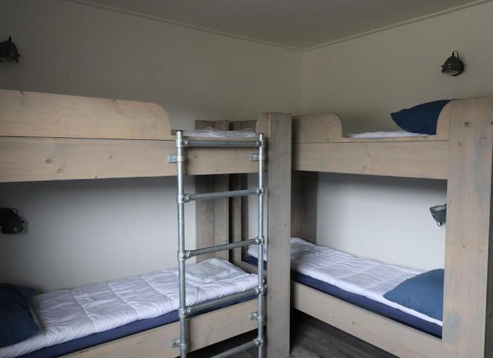 Cozy bedroom with bunk beds in Sier aan Zee vacation home, Hollum, Ameland.