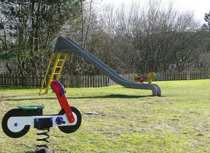 Gemuetliches Wohnzimmer der Ferienwohnung APHRODITE, Hollum, Ameland, mit moderner Einrichtung.