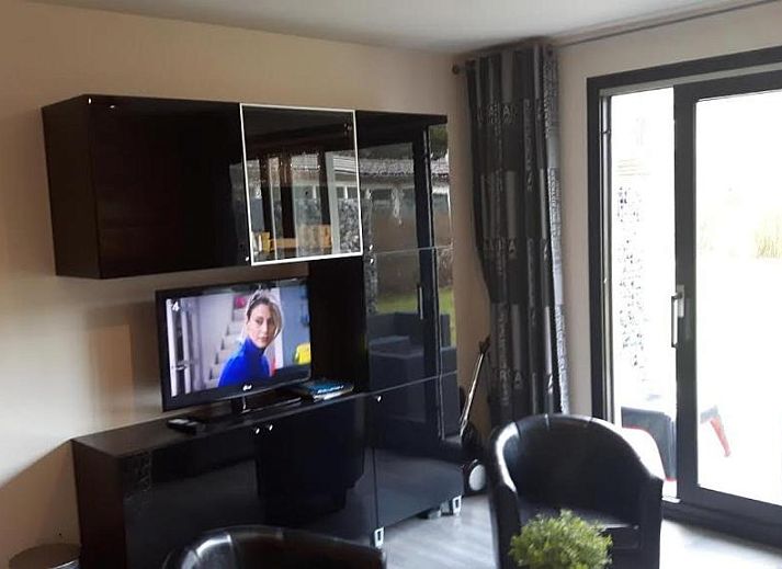 Comfortable bedroom in Apartment Amelander-Kaap TIME-OUT with SWIMMING POOL, Hollum, Ameland, ideal for a relaxing stay.