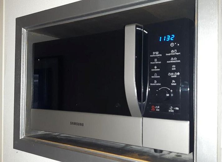 Luxury swimming pool in Apartment Amelander-Kaap TIME-OUT with SWIMMING POOL, Hollum, Ameland, perfect for relaxation and fun.