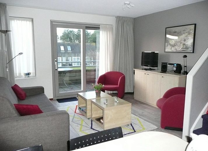 Schlafzimmer in Kaapshoff 32, Hollum, Ameland, mit komfortabler Einrichtung.