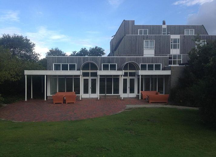 Schlafzimmer in Kaapshoff 32, Hollum, Ameland, mit komfortabler Einrichtung.