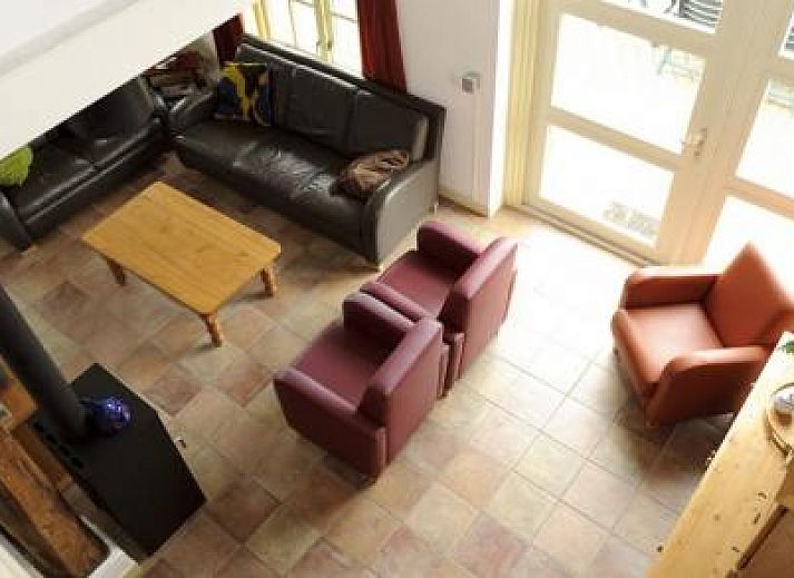 Enjoy peace and quiet at the Farmhouse in Hoorn, Terschelling, with a beautiful terrace and green surroundings.