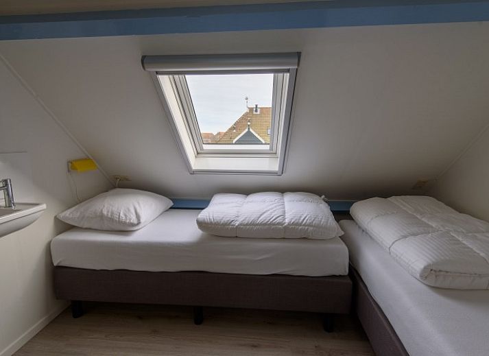 Gezellige zitruimte in vakantiehuis Het Goeie op Terschelling, Lies met uitzicht op de tuin.