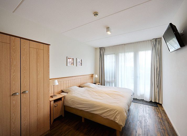 Gemuetliches Wohnzimmer im Wellness Apartment | 5 Pers in Midsland, Terschelling. Gemuetliche Sitzecke mit Tageslicht auf den Watteninseln.