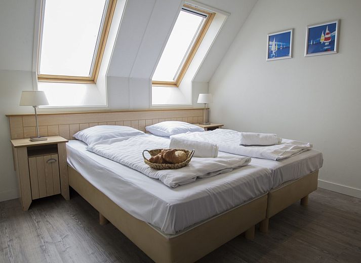 Ruime woonkamer in DeLuxe Appartement, Midsland, Terschelling, ideaal voor gezinnen.