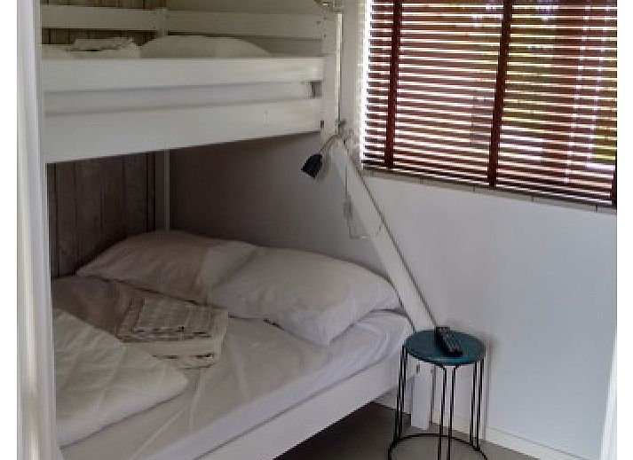 Beach House Terschelling vakantiehuis in Klein Hoorn, omringd door groen en natuur op de Waddeneilanden.