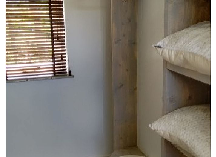 Gezellige binnenruimte van Beach House Terschelling met uitzicht op de natuur in Klein Hoorn, Waddeneilanden.