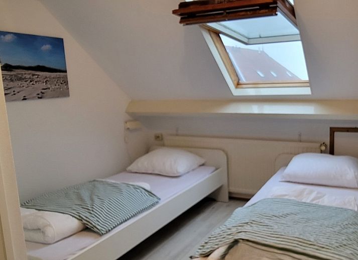 Gemuetliches Wohnzimmer im Ferienhaus Wadhuske, Oosterend, Terschelling mit komfortabler Sitzecke.
