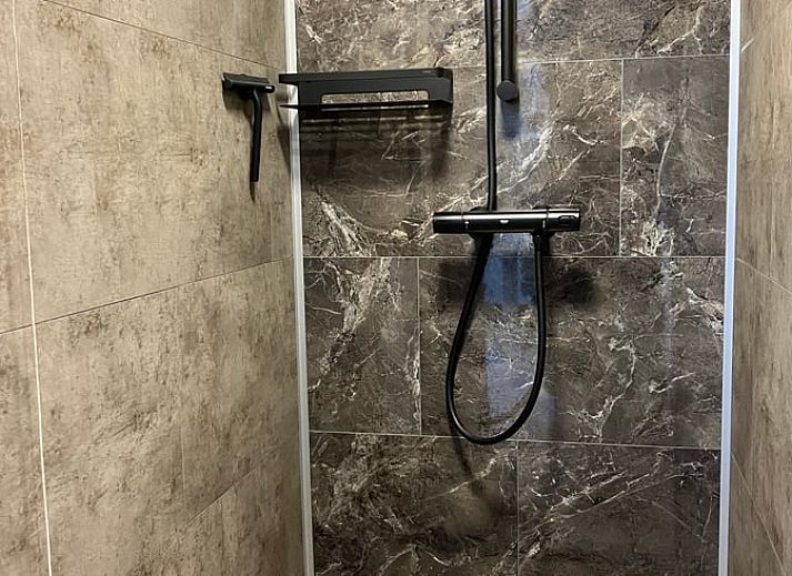 Gezellige binnenruimte van Huisje in Oosterend met moderne inrichting, Terschelling, Waddeneilanden.