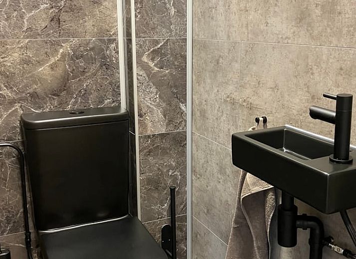 Gezellige binnenruimte van Huisje in Oosterend met moderne inrichting, Terschelling, Waddeneilanden.