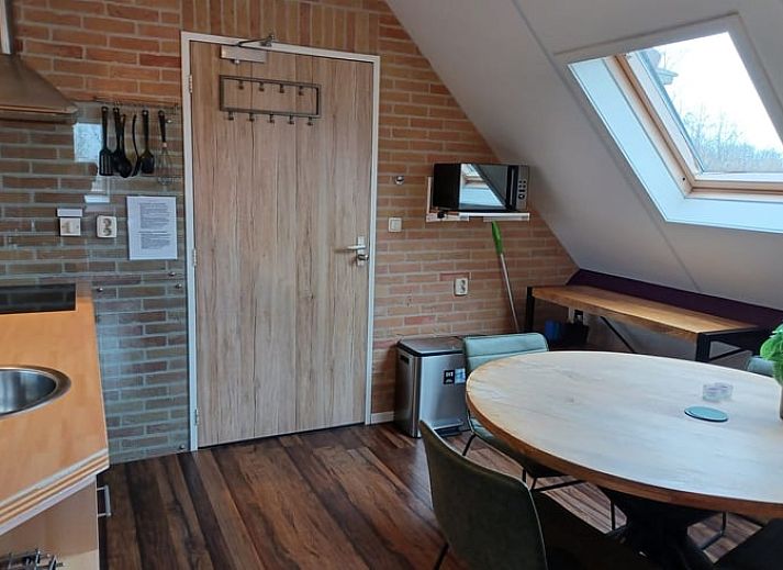Gemuetliches Wohnzimmer im modern eingerichteten Ferienhaus in Oosterend auf Terschelling.