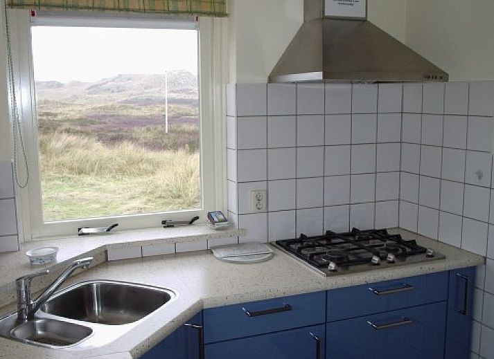 Bright living room in Karbonkel vacation home overlooking the nature of Terschelling.