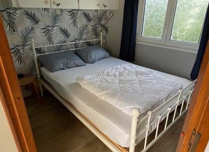 Zonnig terras bij De Clochard nr 37 in Midsland Noord, Terschelling, Waddeneilanden.