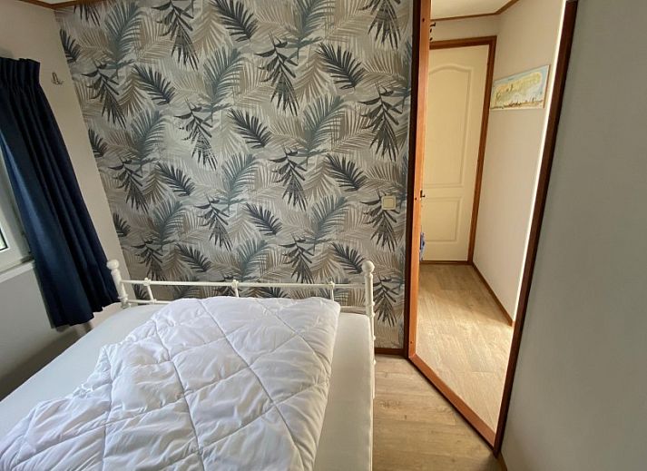 Zonnig terras bij De Clochard nr 37 in Midsland Noord, Terschelling, Waddeneilanden.