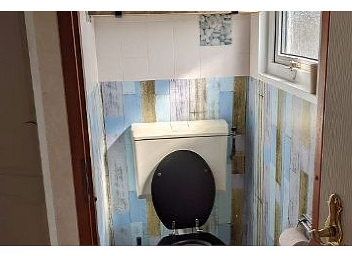 Gezellige zithoek in chalet De Clochard nr 37, Midsland Noord, Terschelling.