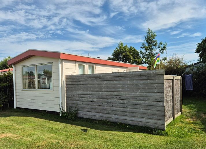 Bright living room of De Doorloper chalet in Midsland Noord, Terschelling with modern decor on the Wadden Islands.