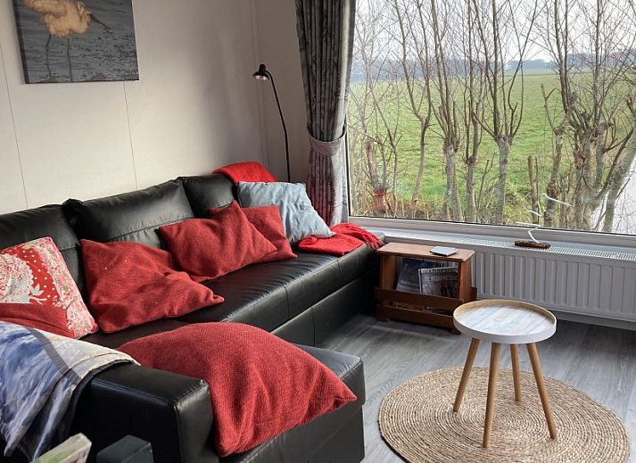 Unesco chalet in Midsland Noord met zonnig terras op Terschelling, Waddeneilanden.