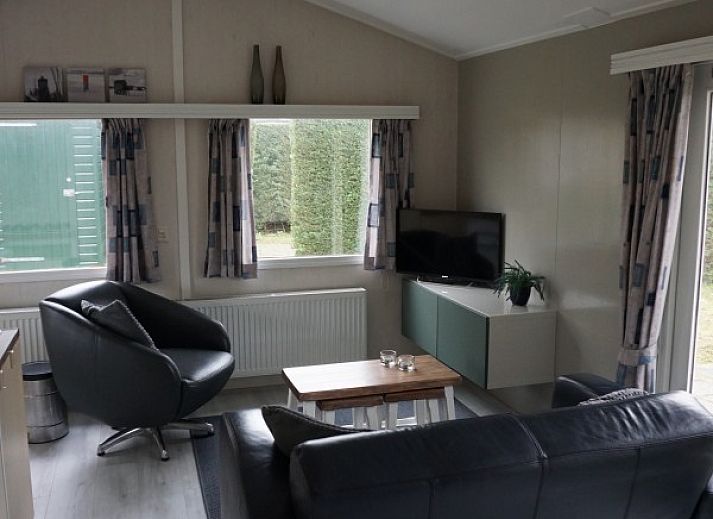 Dunamar chalet in Midsland Noord, Terschelling with sunny terrace and garden furniture.