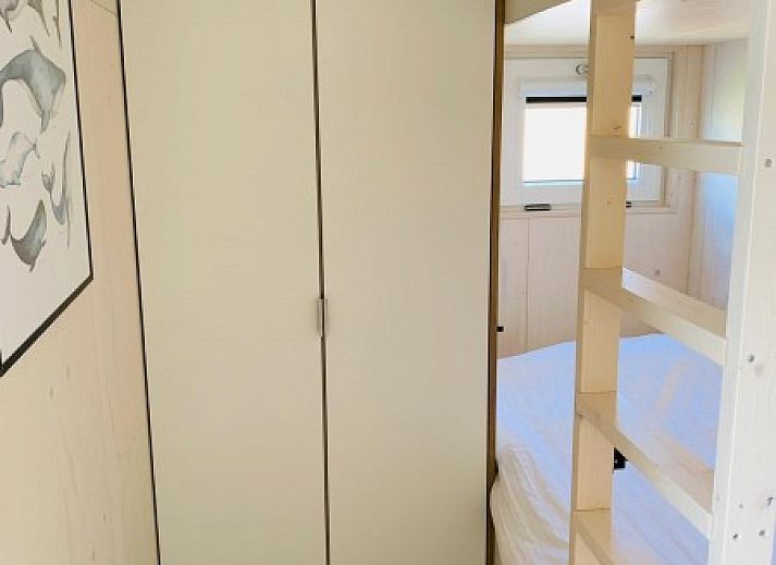 Cozy interior of Kleine Walvis vacation home in Midsland Noord, Terschelling with modern furnishings.