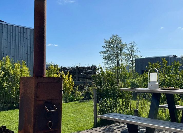 Cozy interior of Kleine Walvis vacation home in Midsland Noord, Terschelling with modern furnishings.