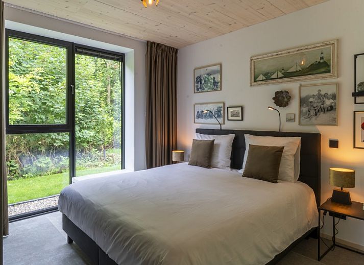 Vakantiehuis Noordhoek in Midsland Noord, Terschelling, met zonnig terras omringd door natuur op de Waddeneilanden.