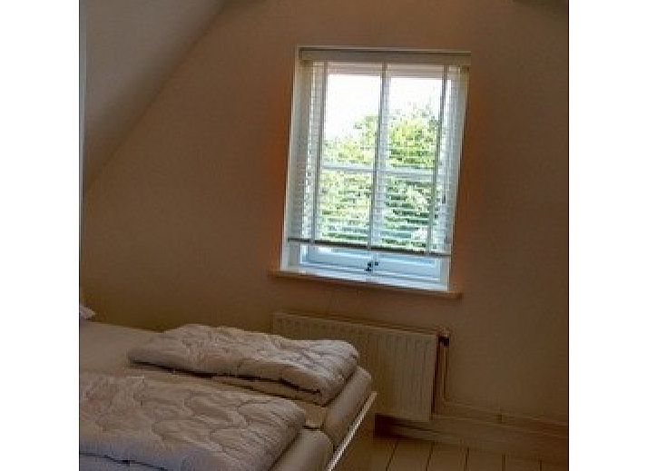 Charmant vakantiehuis WadsEb.com met een ruime tuin in Klein Hoorn, Terschelling, ideaal voor een ontspannen verblijf.