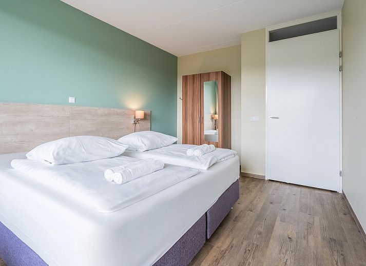 Ruime woonkamer in West Terschelling 6-persoons appartement 6CA met moderne meubels, Terschelling, Waddeneilanden.