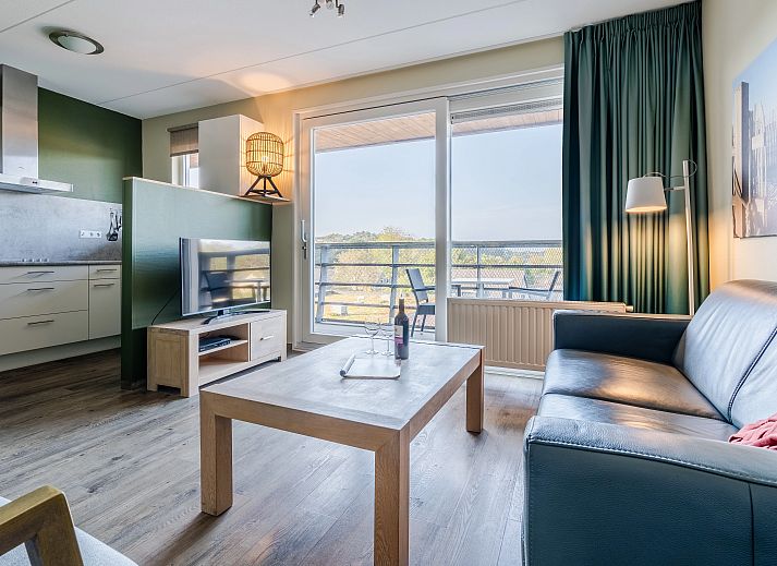 Bright sitting area with view in West Terschelling 2-person apartment 2CA, Terschelling.