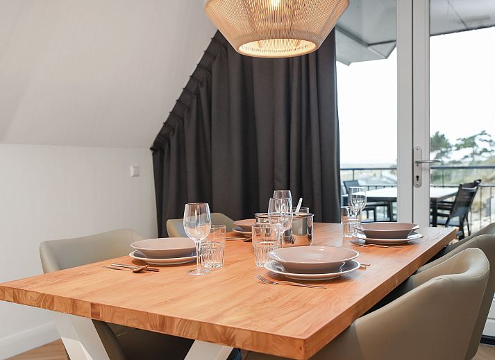 Stijlvolle binnenruimte van het 4-persoons appartement 4C2 in West-Terschelling, Terschelling, met moderne inrichting.