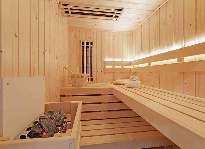 Dining area with view in 6-person penthouse 6LP, West-Terschelling, Wadden Islands, ideal for cozy meals.