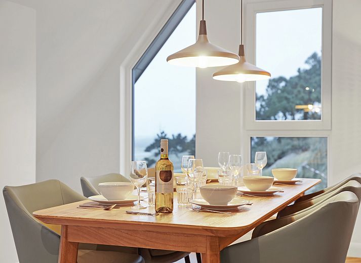 Dining area with view in 6-person penthouse 6LP, West-Terschelling, Wadden Islands, ideal for cozy meals.