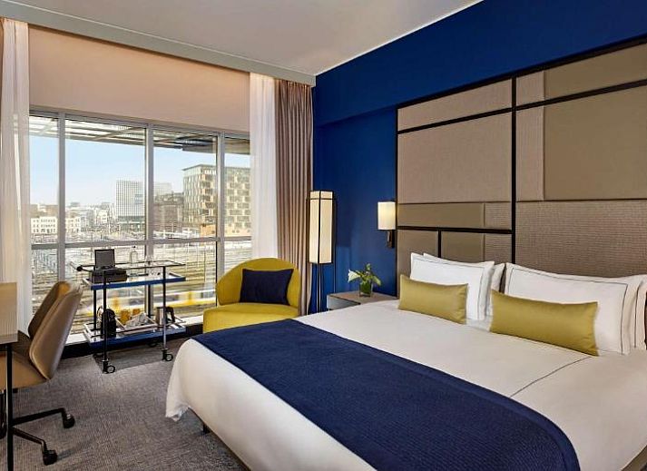 Stijlvolle slaapkamer in Park Plaza Utrecht, vakantieappartement in Utrecht met modern interieur en comfortabele bedden.