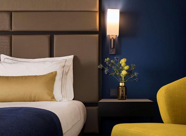 Lichte kamer in Park Plaza Utrecht, vakantieappartement in Utrecht met uitzicht op de stad en luxe voorzieningen.