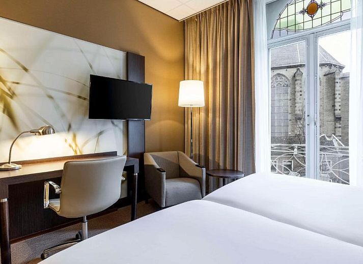 Stijlvolle werkruimte in NH Centre Utrecht Hotel, ideaal voor zakelijke reizigers in Utrecht.